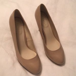 Patten leather pumps